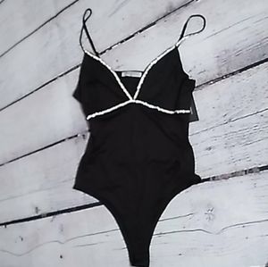 See updated listingDiamonds V-neck Backless One Piece Body suit Romper Black